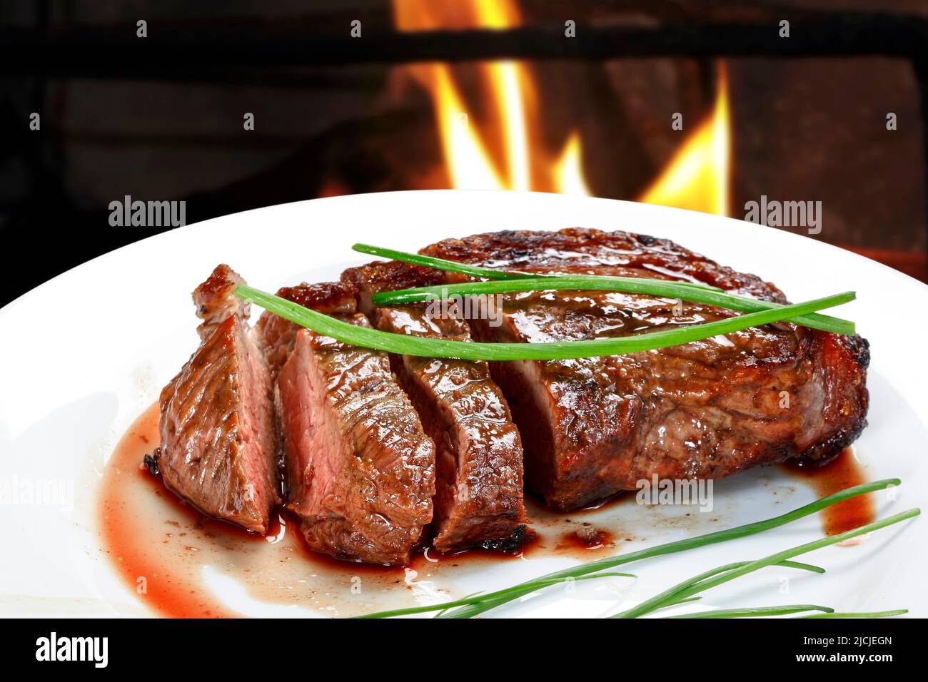 Barbecue steak on charcoal over high heat Stock Photo Alamy