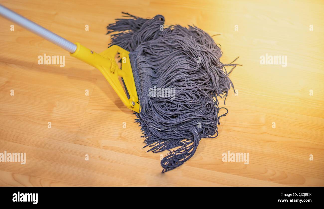 The Dirty Mop Cleaning On The Wood Floor Stock Photo Alamy