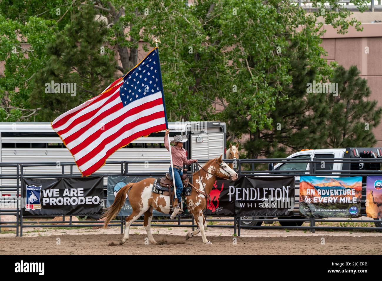 Rodeo in Colorado Springs, Colorado starts with the National Anthem and