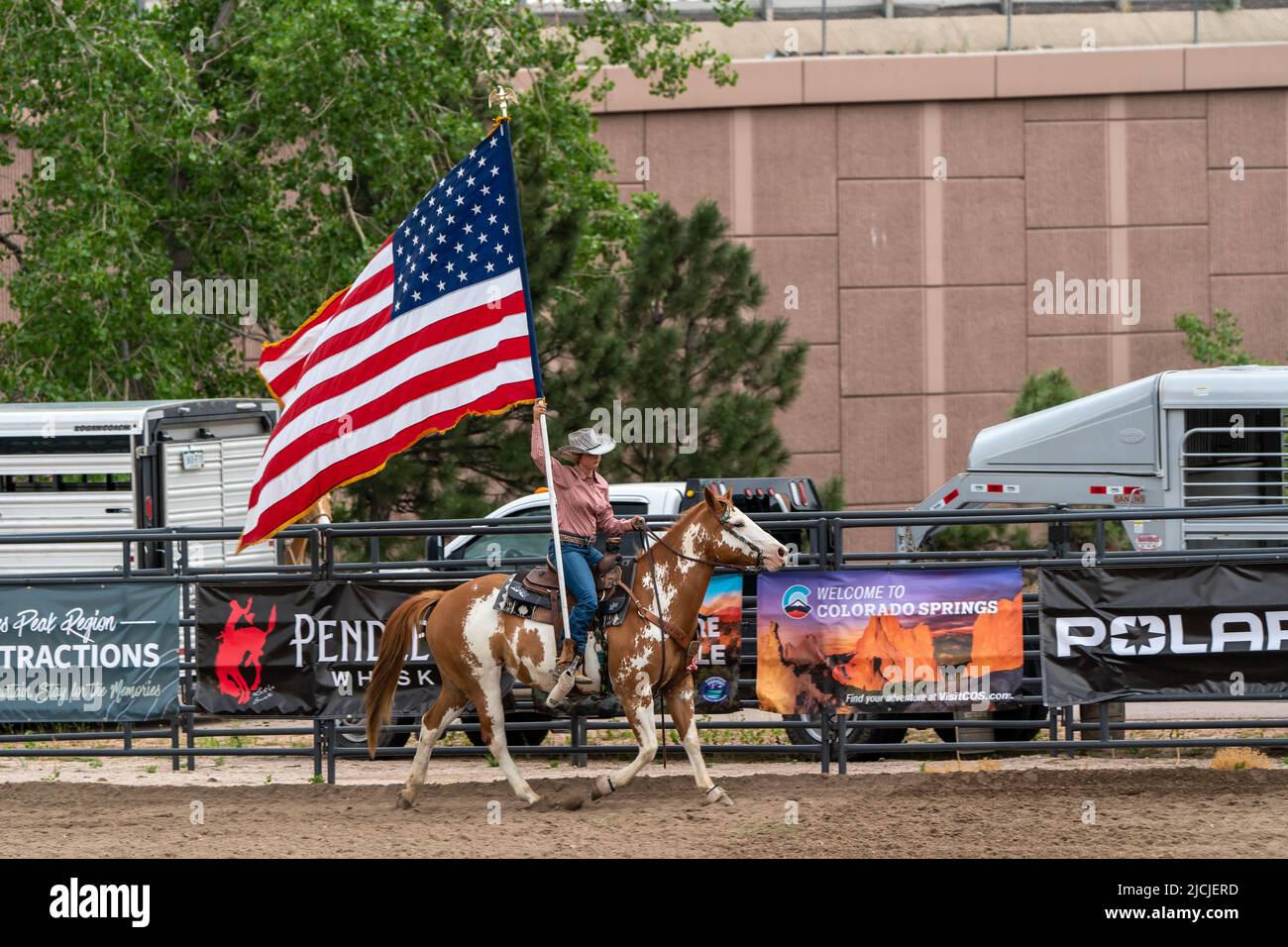 Rodeo in Colorado Springs, Colorado starts with the National Anthem and