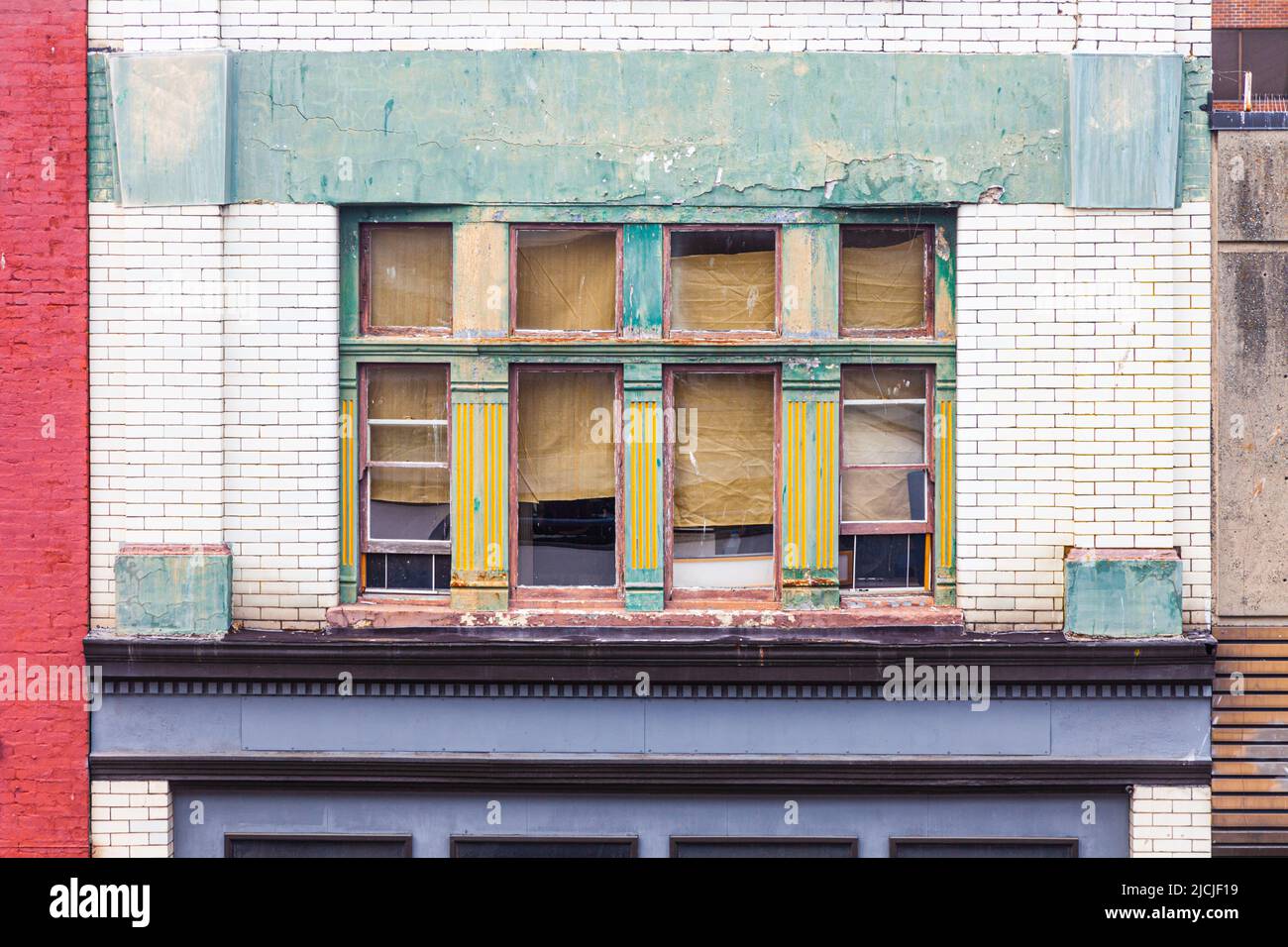 Drab exterior of an abandoned storefront in Victoria British Columbia Canada Stock Photo