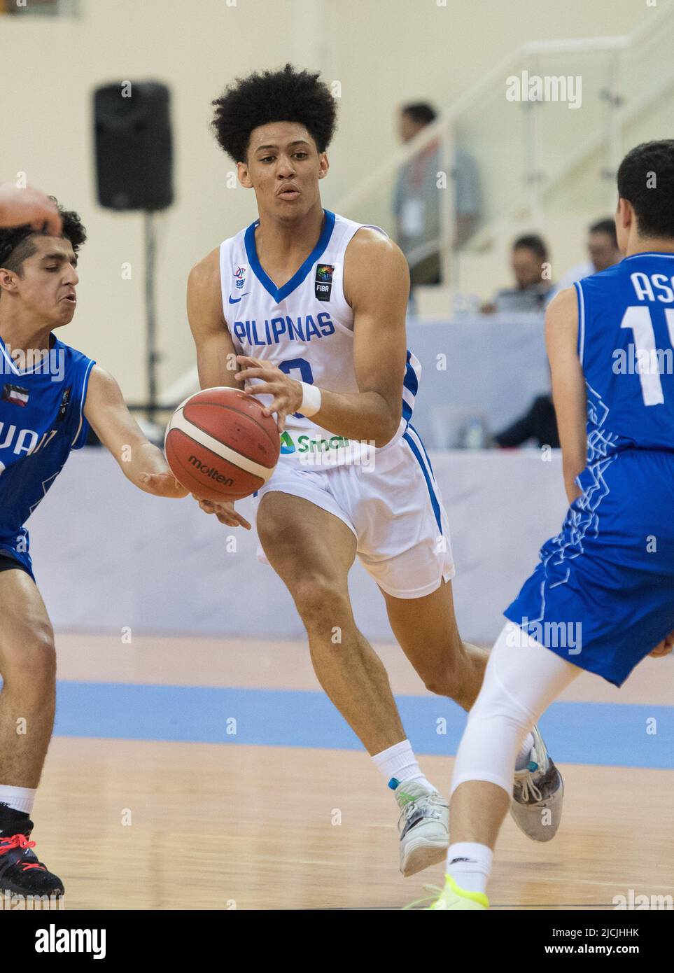 Caelum Emmanuel Harris (C) of the Philippine Basketball team in action ...