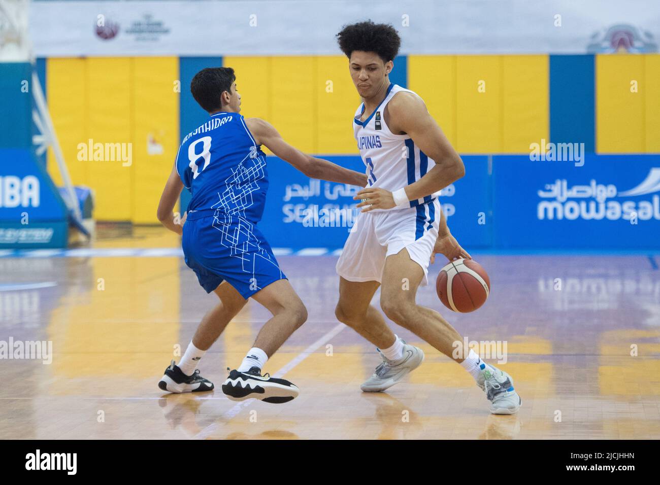 Abdullah kh m a Alresheedan (L) of Kuwait Basketball team and Caelum ...