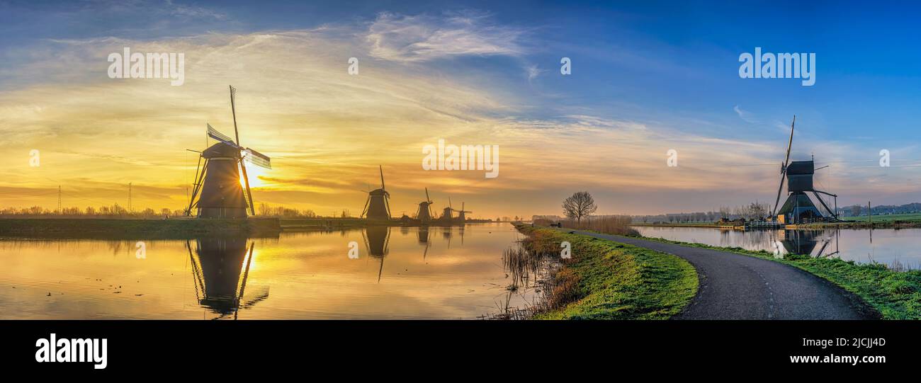Rotterdam Netherlands, sunrise panorama nature landscape of Dutch Windmill at Kinderdijk Village Stock Photo