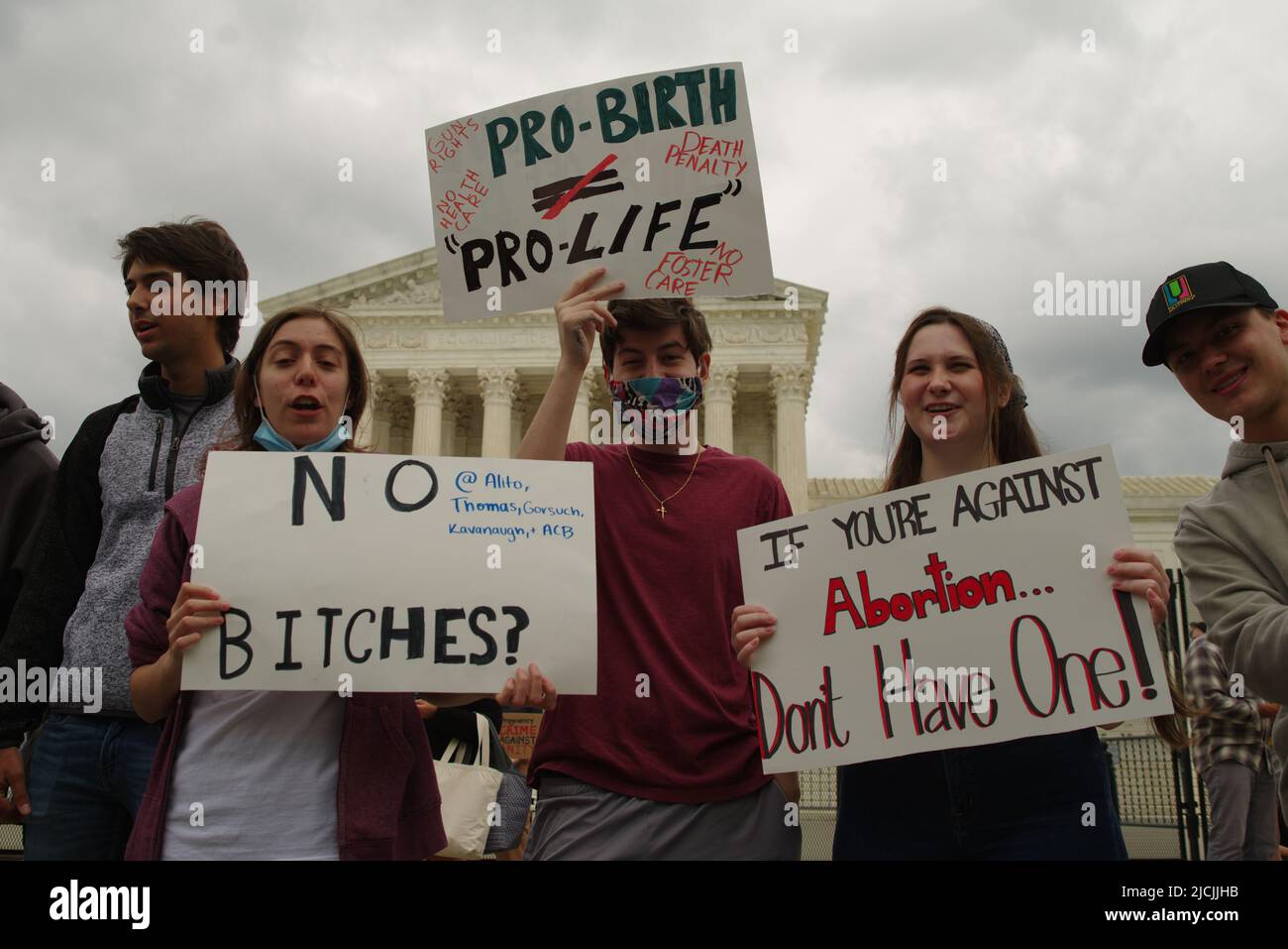 Washington - 5 May 2022: Pro-choice protesters chant and hold signs supporting Roe v. Wade in front of the U.S. Supreme Court. Stock Photo