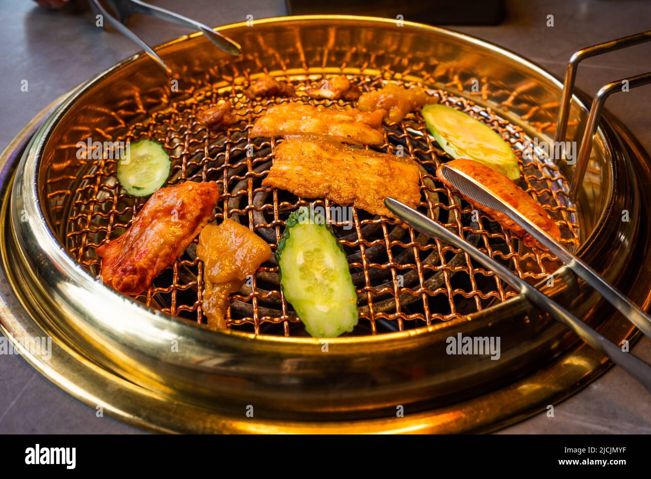 Chinese barbecue grill with meat and vegetables Stock Photo