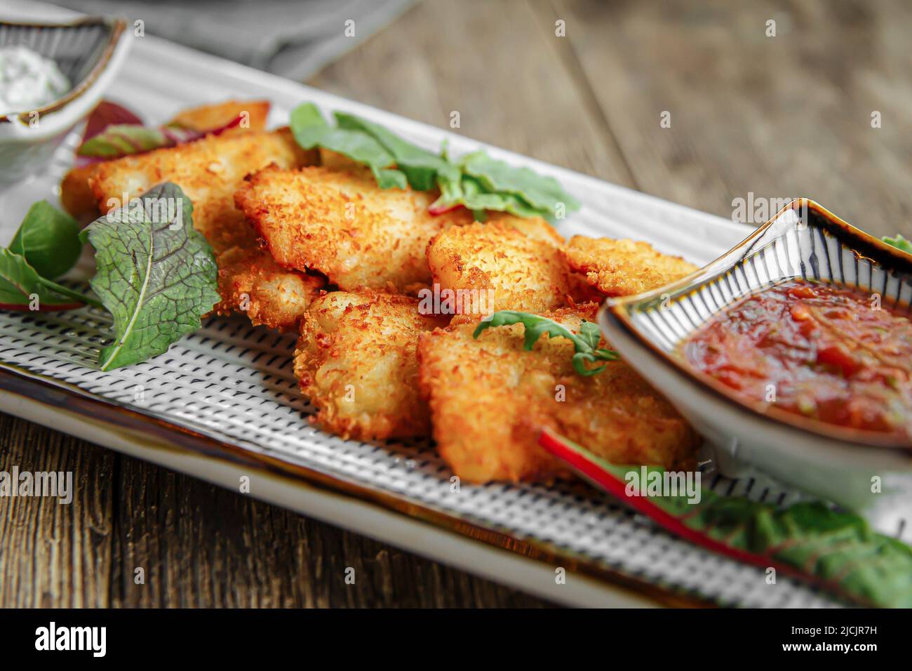 Top view on portion of gourmet chicken nuggets Stock Photo