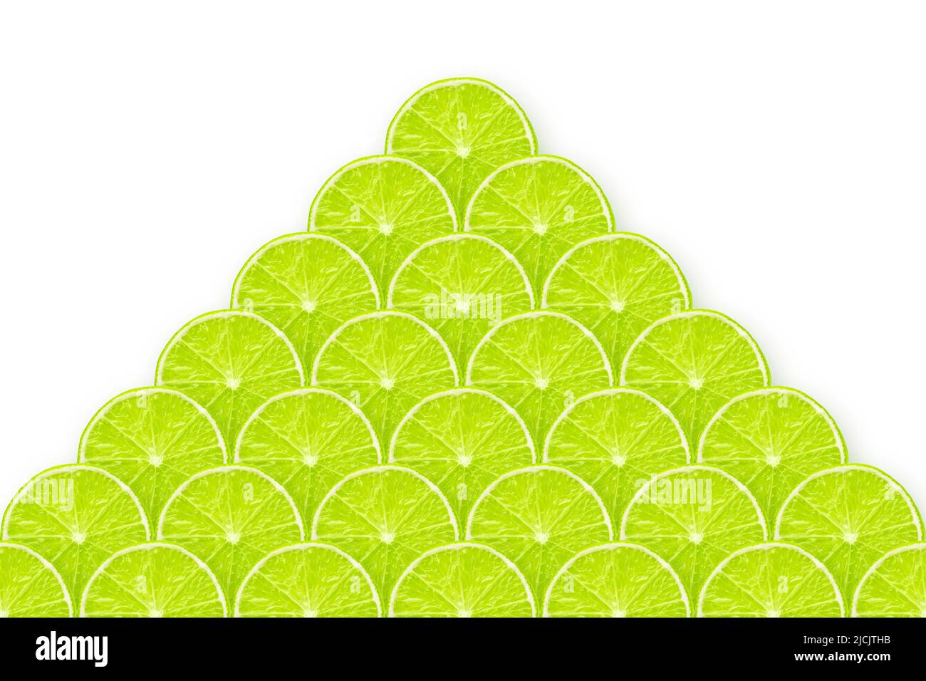 pyramid made from many fresh lime slices on white Stock Photo