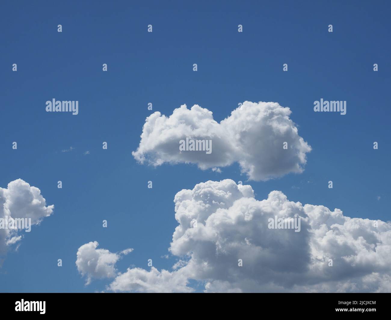 blue sky with clouds useful as a background Stock Photo Alamy