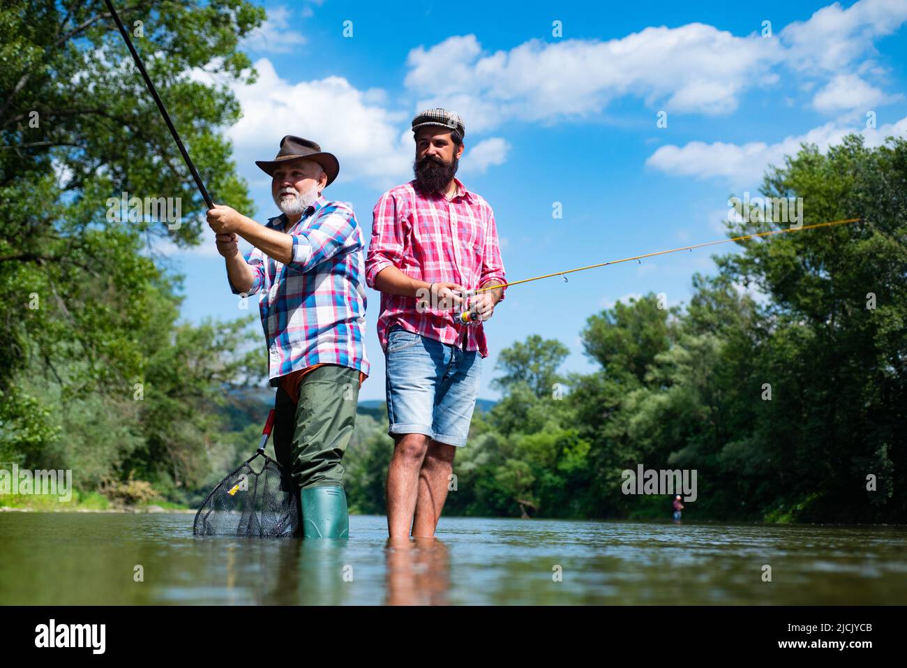 Father and son fishing by a lake hi-res stock photography and images - Page  8 - Alamy
