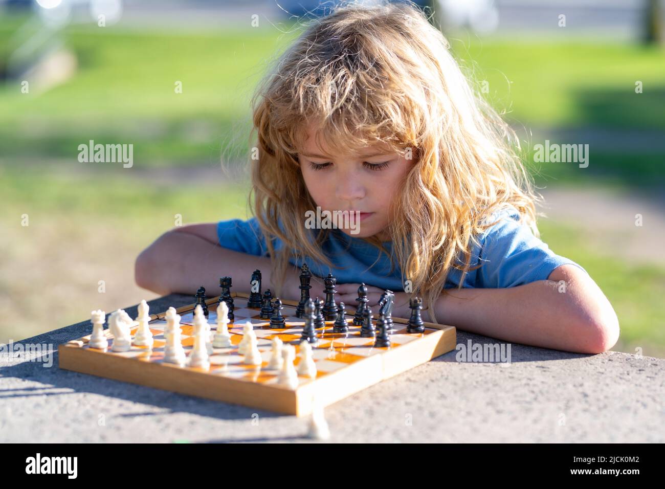 Kids Early Development. Pupil Kid Thinking about His Next Move in a Game of  Chess. Stock Image - Image of child, chess: 172839087