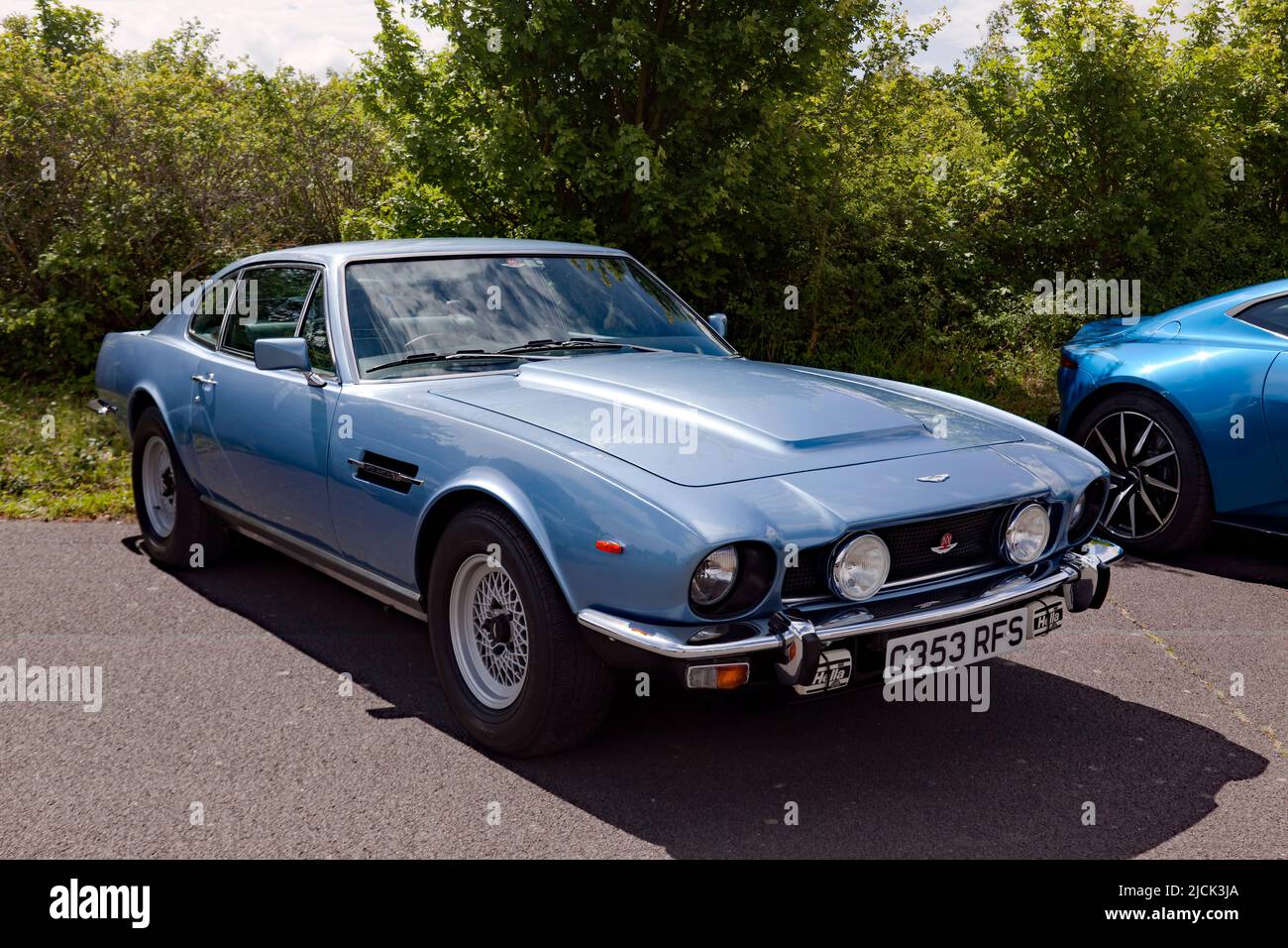Three-quarters front view of a Blue, 1985, Aston Martin V8 Vantage on display at the Deal Classic Car Show 2022 Stock Photo