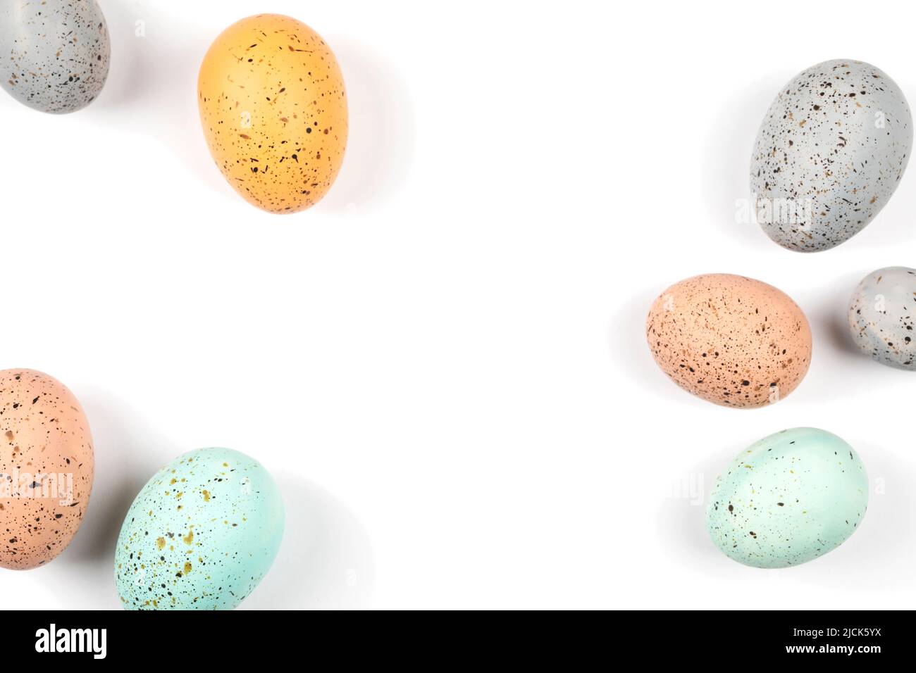 Easter eggs. Easter decoration. Happy Easter card.  Top view of easter colored eggs, Copy space. Stock Photo
