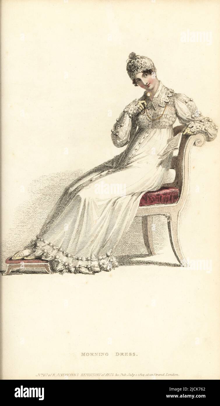 Regency woman in morning dress reading a letter with a lorgnette, seated on a chair with footrest, 1814. In round robe of fine cambric, buttoned down the front, Vandyke lace trim, cotton ball fringe, lace collar, long sleeves with ball fringe, orange net cap, primrose kid slippers. Vol. 12, Plate 3, July 1, 1814. Handcoloured copperplate engraving by Thomas Uwins from Rudolph Ackermann's Repository of Arts, Strand, London. Stock Photo
