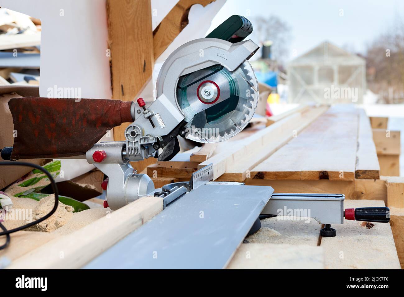 Miter saw for cutting boards and planks, outdoor Stock Photo