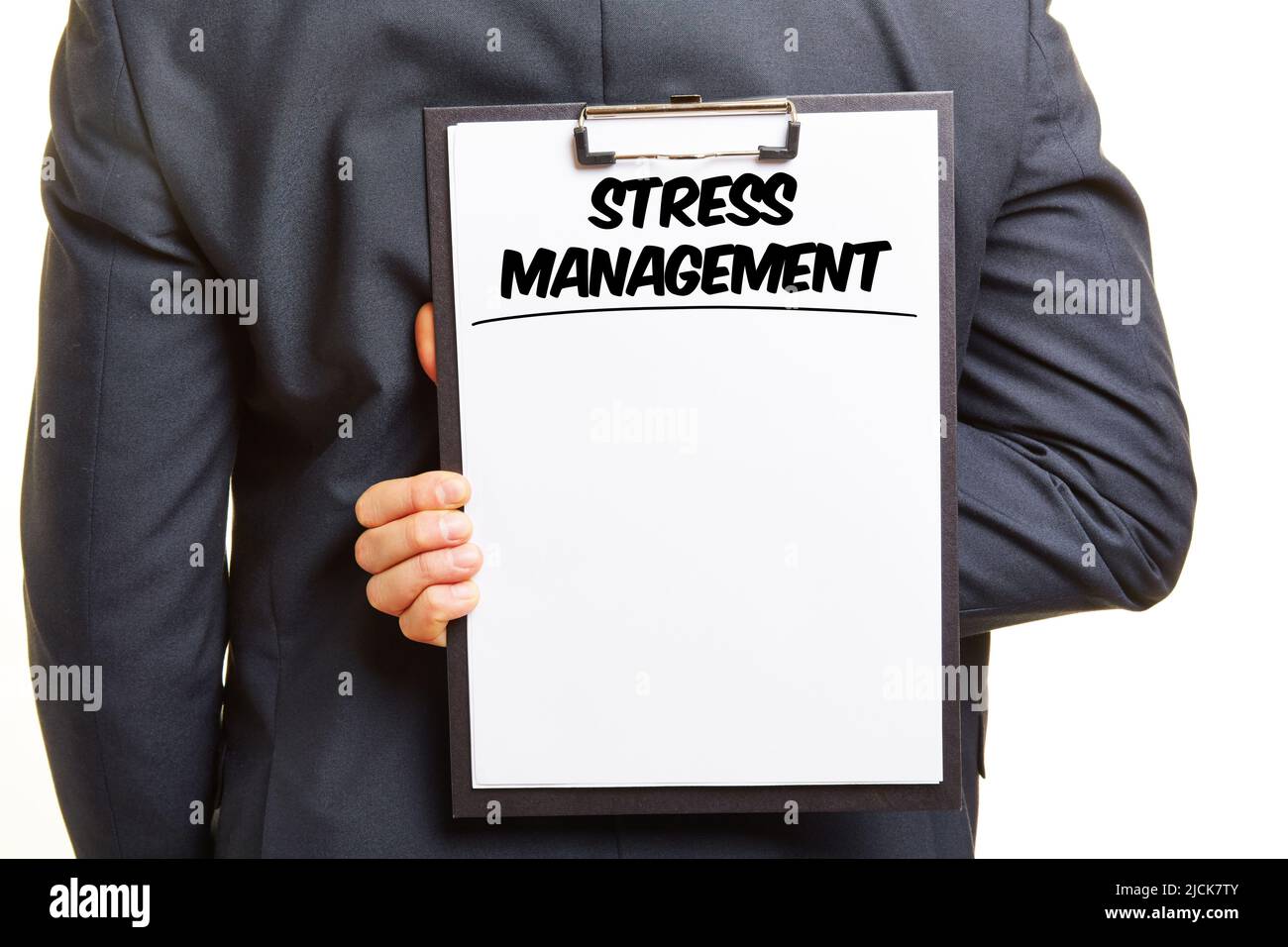 Businessman holding clipboard with lettering Stress Management and copy space as concept Stock Photo