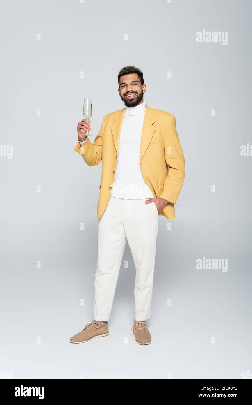 Man holding wine glass full length hi-res stock photography and images -  Alamy