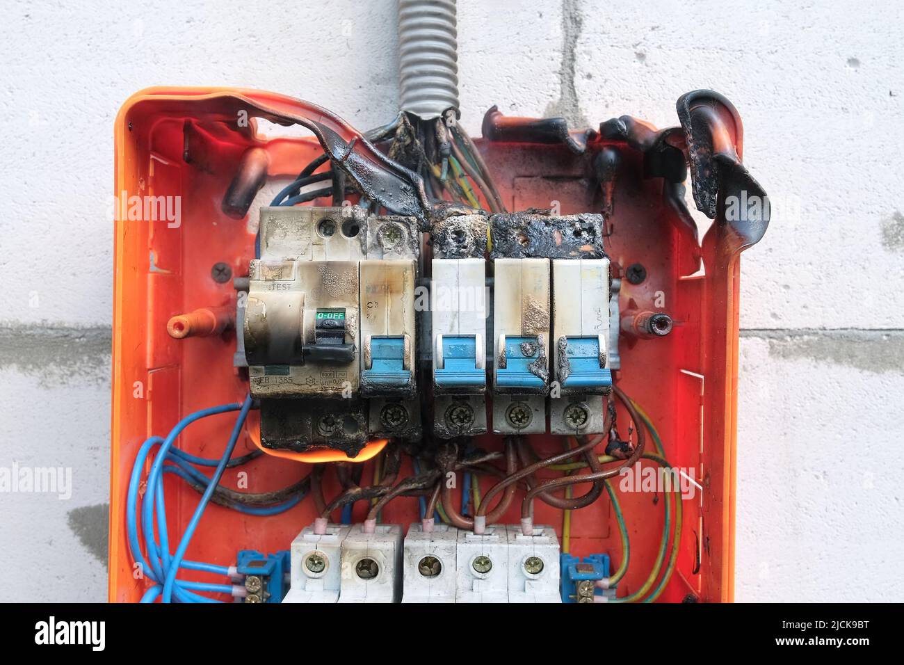 Burnt switchboard from overload or short circuit Stock Photo