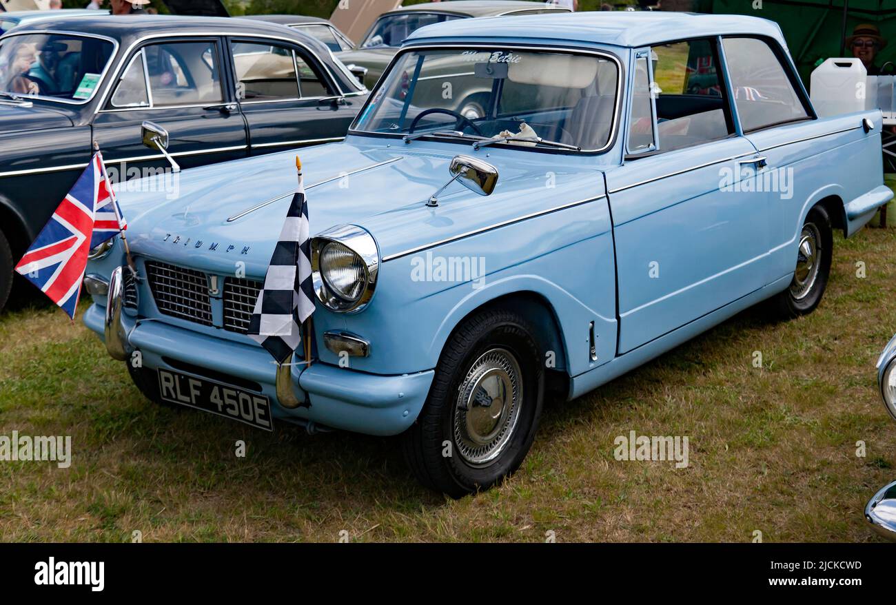 Three-quarters front view of a Blue, 1967, Triumph Herald,  'Miss Betsie', on display at the Deal Classic Car Show 2022 Stock Photo