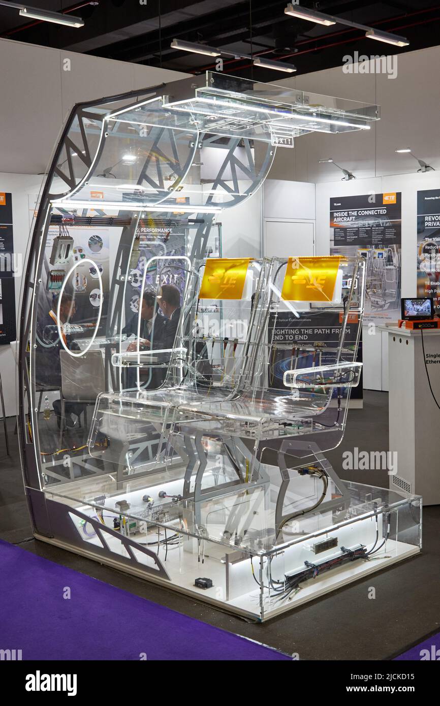 Hamburg, Germany. 14th June, 2022. A transparent trade show exhibit of an aircraft seat from TE-Connectivity stands at the Aircraft Interiors Expo (AIX) in the Hamburg exhibition halls. It illustrates the complexity of the electronics that ensure in-flight entertainment, travel comfort and safety for passengers. The Aircraft Interiors Expo will take place from June 14-16, 2022. Credit: Georg Wendt/dpa/Alamy Live News Stock Photo