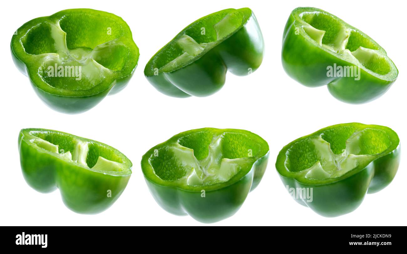 Sliced green peppers isolated over white background Stock Photo - Alamy
