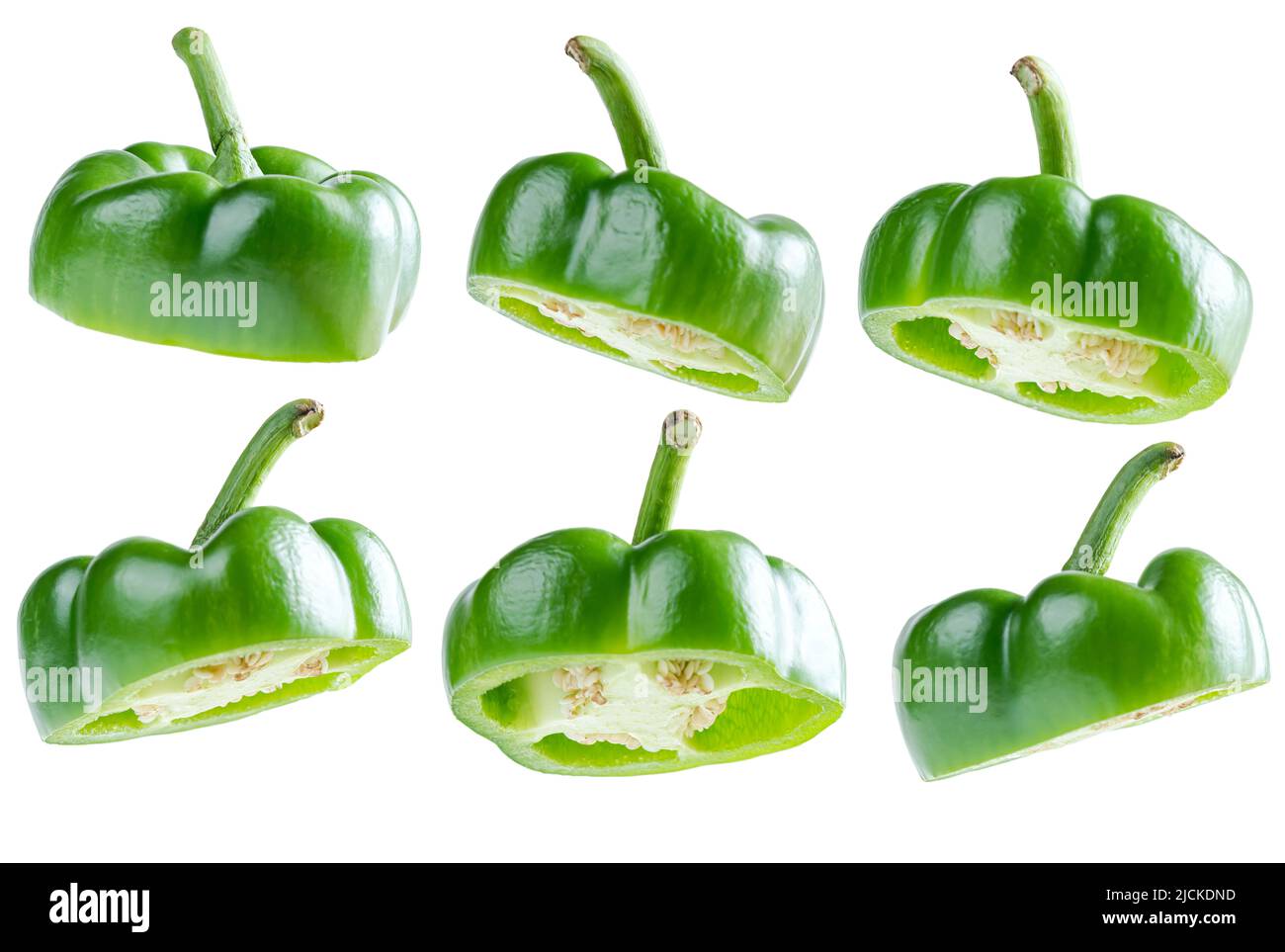 Sliced green peppers isolated over white background Stock Photo - Alamy