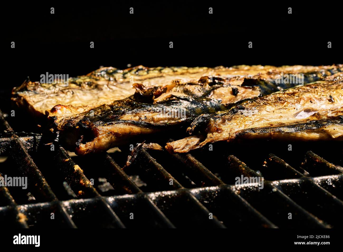 Barbecue of verdel or mackerel fish made on the grill with spices. High quality photo Stock Photo