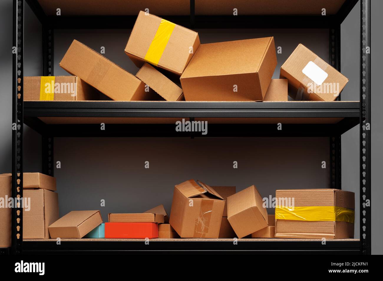 Rows of shelves with cardboard boxes in modern warehouse Stock Photo ...