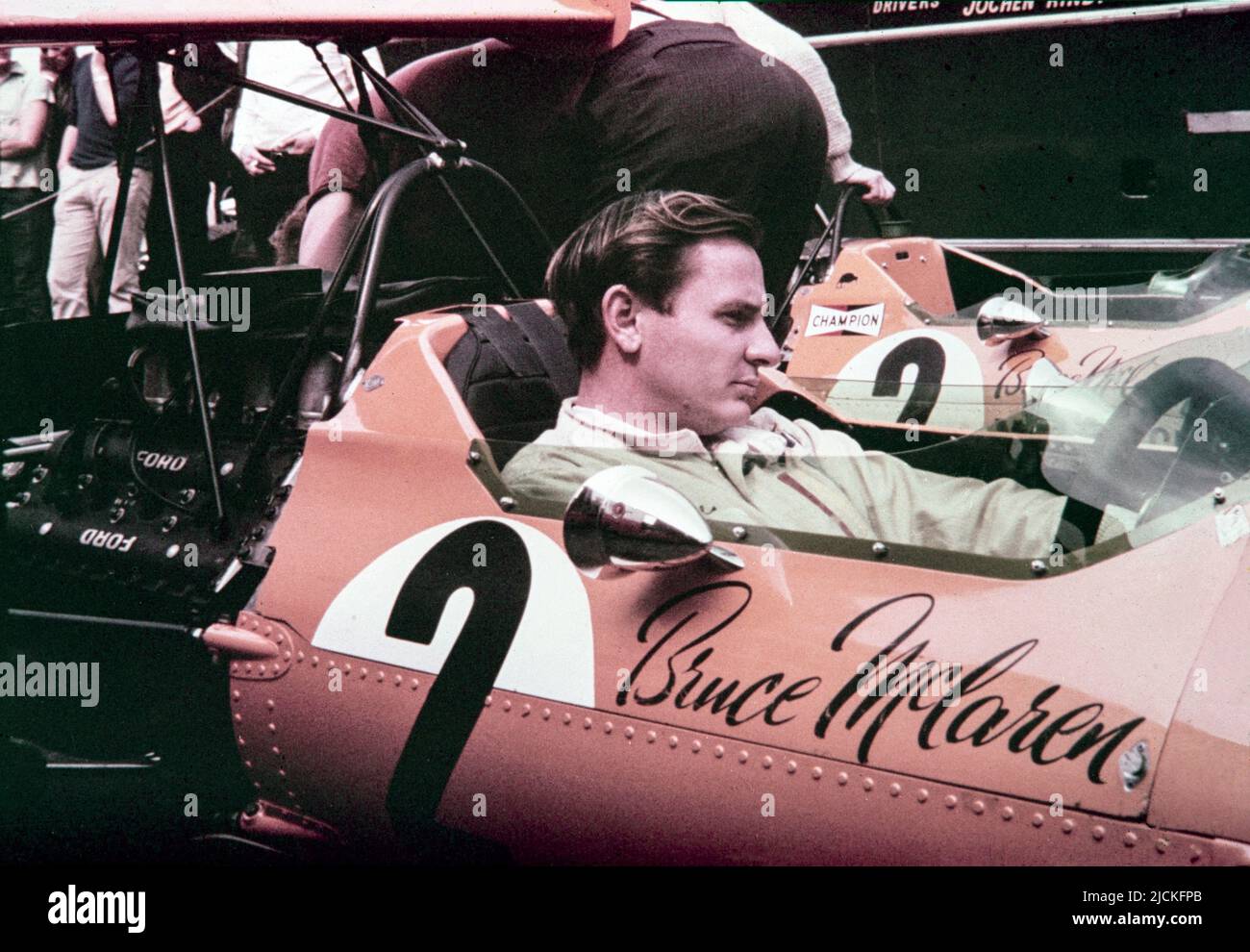 1968 British Formula 1 Grand Prix at Brands Hatch. The New Zealand racing Driver Bruce McLaren sitting in the cockpit of the Bruce McLaren Racing McLaren M7A-Ford, race number 2. Stock Photo