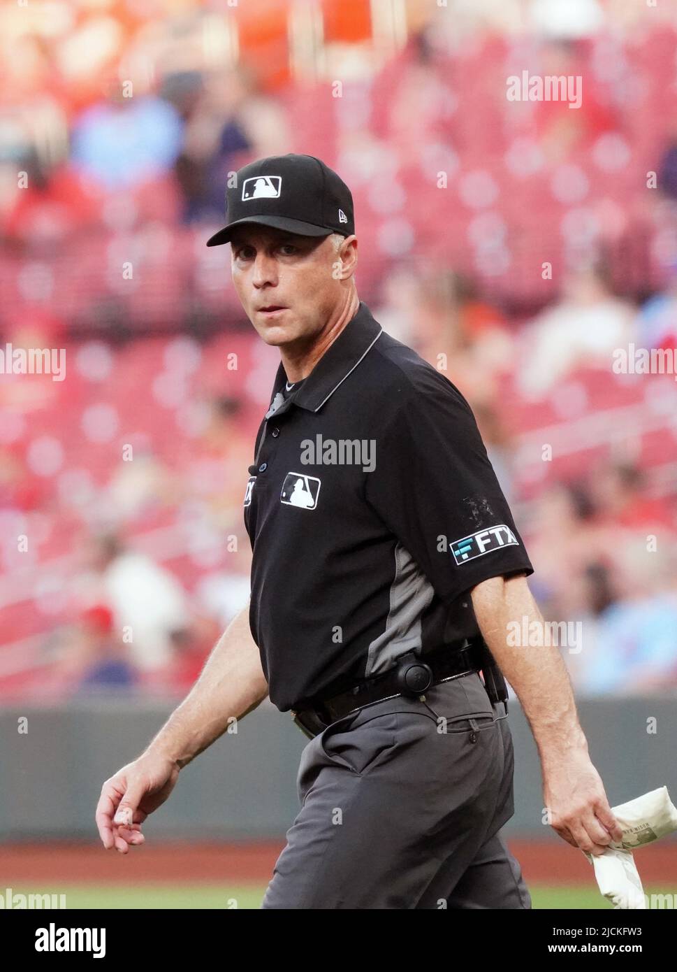 St. Louis, United States. 14th June, 2022. Third base umpire Dan Iassogna brings out a new rozin bag for the pitching mound during the Pittsburgh Pirates-St. Louis Cardinals baseball game at Busch Stadium in St. Louis on Monday, June 13, 2022. Photo by Bill Greenblatt/UPI Credit: UPI/Alamy Live News Stock Photo