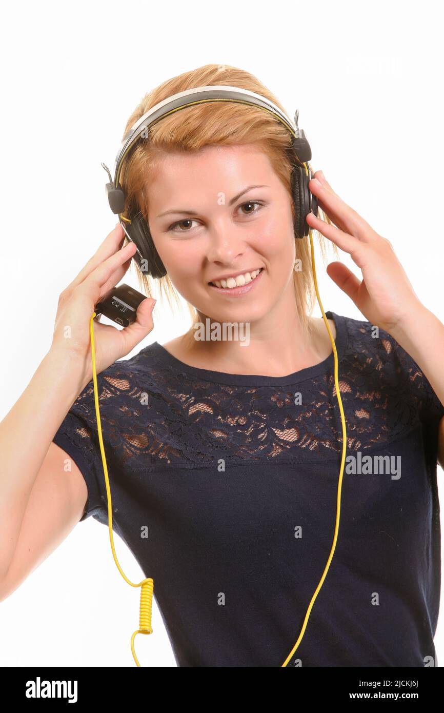 woman is using a headphone Stock Photo