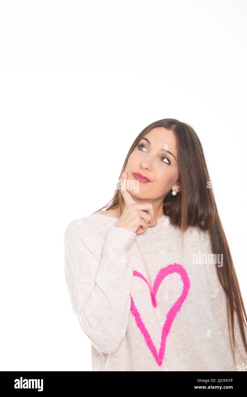 Spanish woman dreaming against white background - stock photo Stock Photo