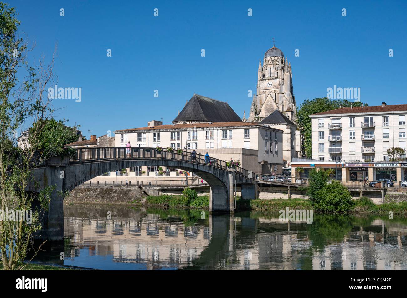 View of Saintes and the Charente river, dominated by the spire of the church église Saint-Pierre, France Stock Photo
