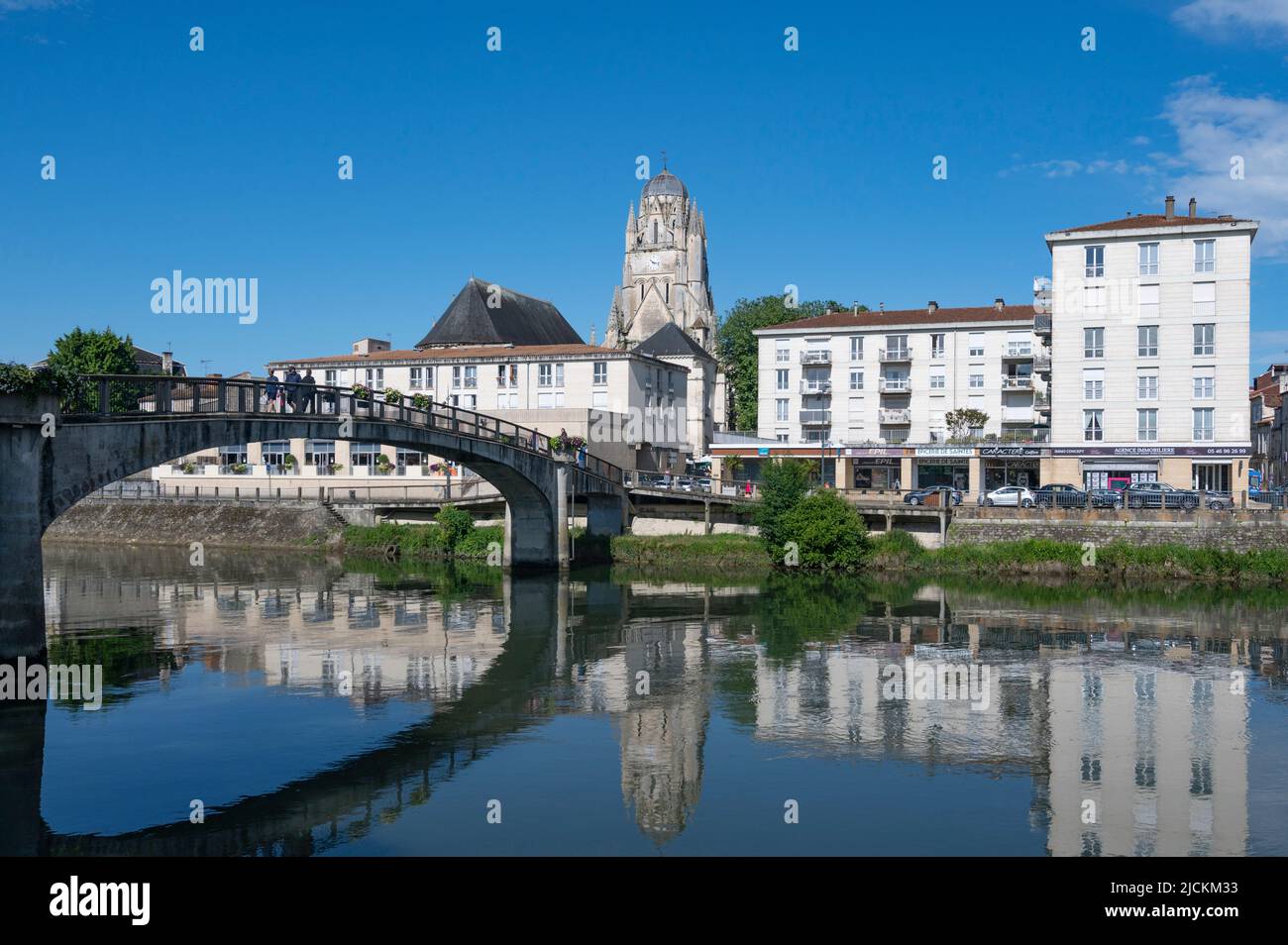 View of Saintes and the Charente river, dominated by the spire of the church église Saint-Pierre, France Stock Photo