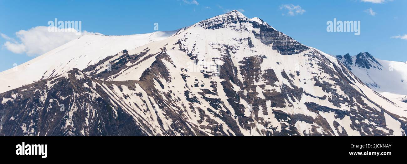 beautiful panorama of a snowcapped mountain, Kazbegi, Georgia. High quality photo Stock Photo