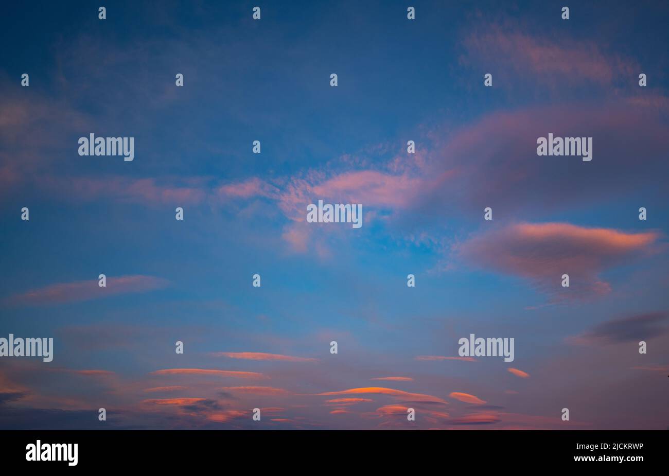 Beautiful sunset or sunrise sky with interesting cloud formation on island of Faial in the Azores in Portugal empty space for type horizontal format Stock Photo