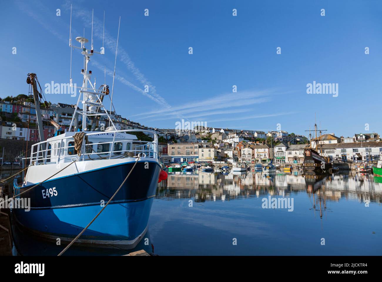 UK, England, Devon, Torbay, Brixham Harbour with Trawler moored near The Quay Stock Photo