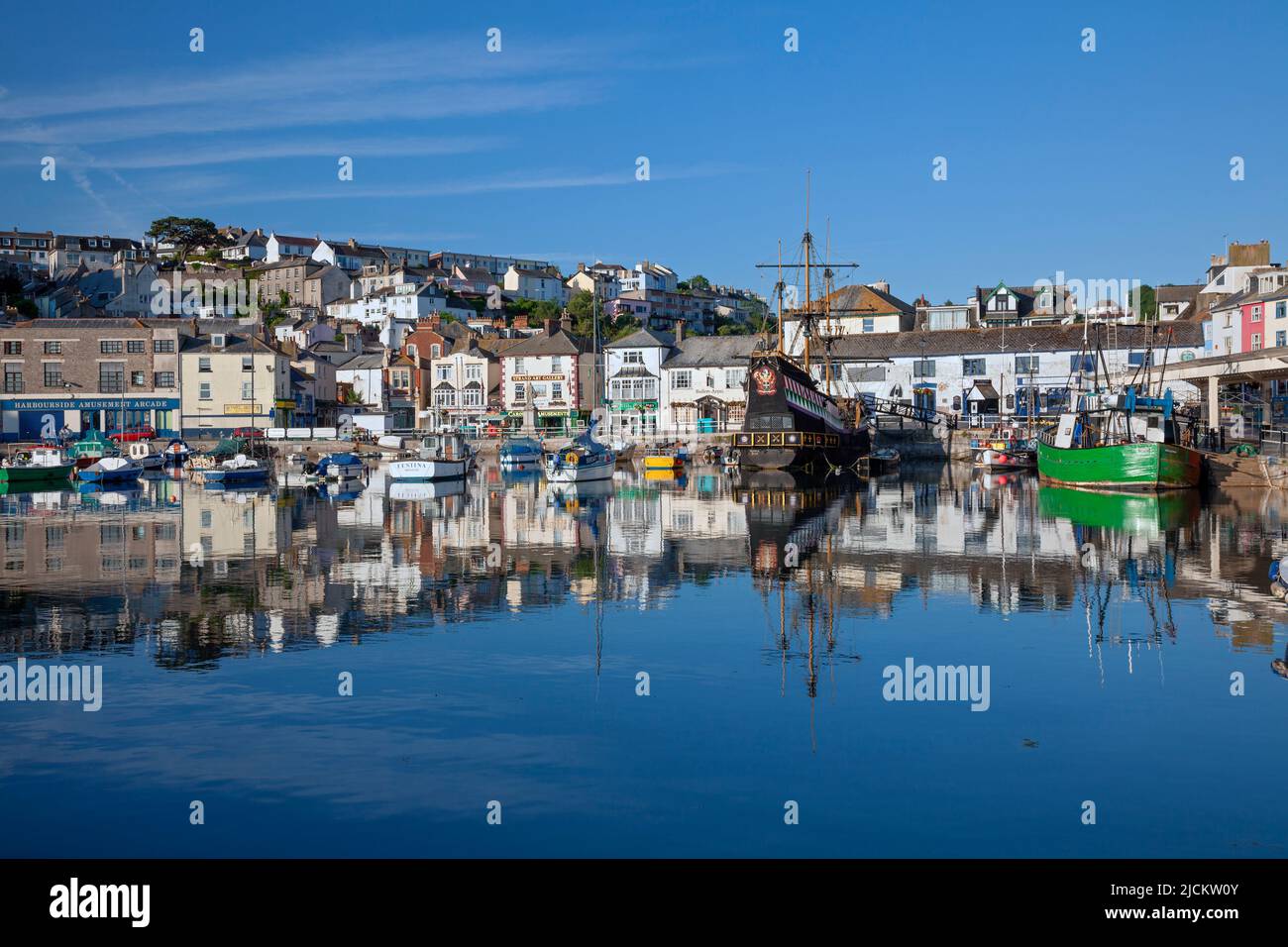 UK, England, Devon, Torbay, Brixham Harbour and The Strand with moored Boats and The Golden Hind (Museum ship) Stock Photo