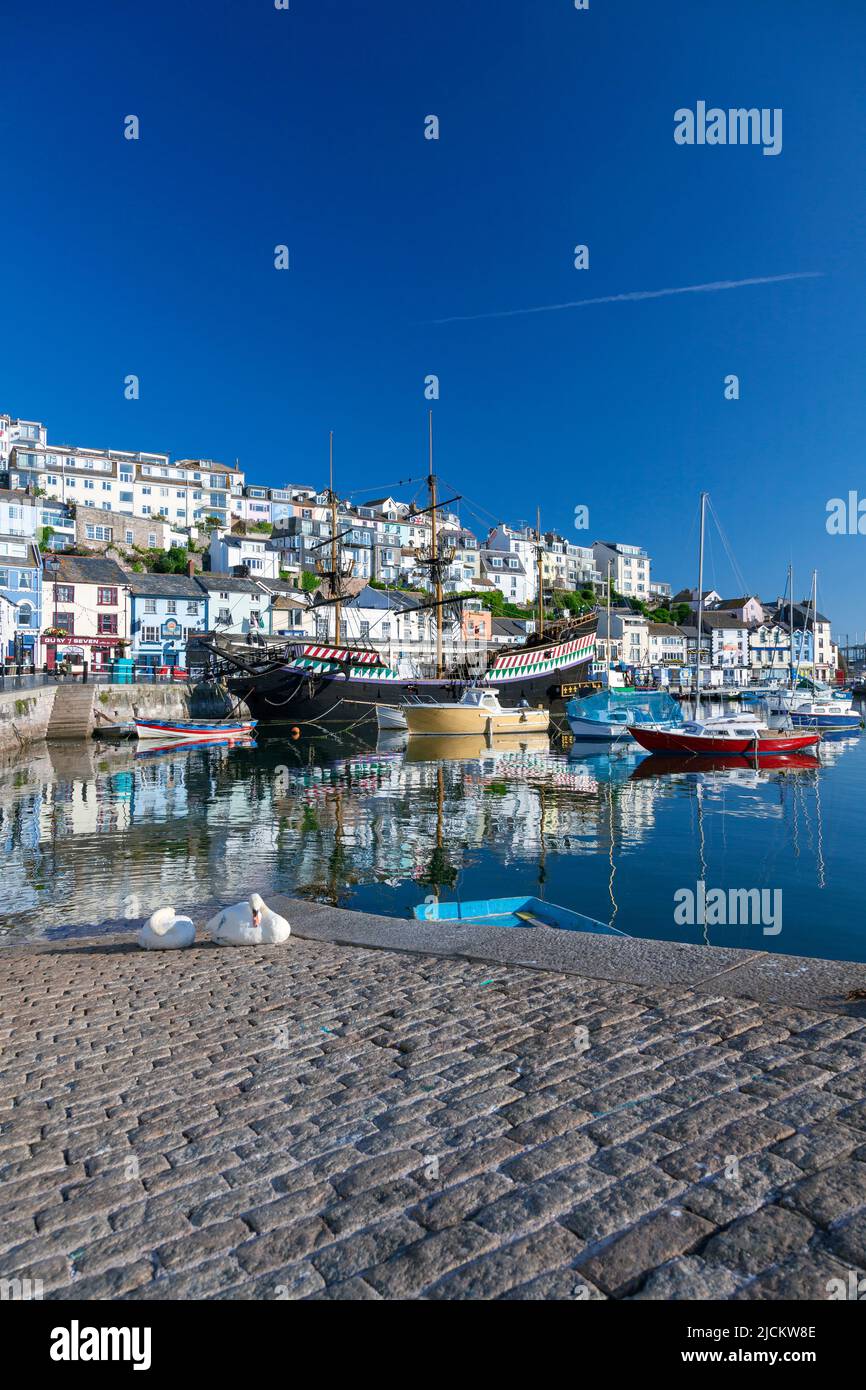 UK, England, Devon, Torbay, Brixham Harbour and The Quay with moored Boats and The Golden Hind (museum ship) Stock Photo