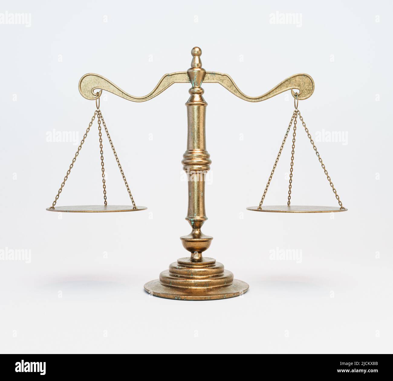 Ornate brass justice scales on a white isolated background - 3D render Stock Photo