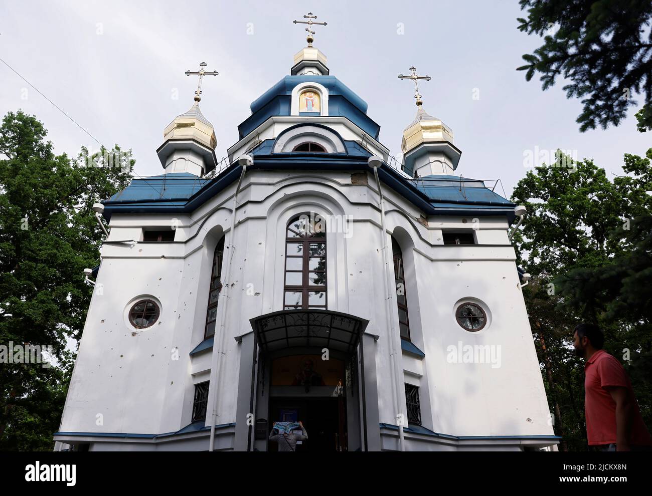 A view of Saint Nicholas church, pockmarked with shrapnel and bullet holes, as Russia's attack on Ukraine continues, in Irpin, Kyiv region, Ukraine June 4, 2022. Picture taken June 4, 2022.  REUTERS/Edgar Su Stock Photo