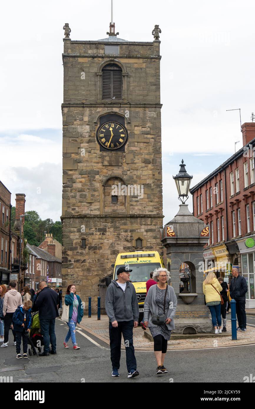 The clock tower and water fountain in Morpeth town centre, Northumberland, UK. Stock Photo