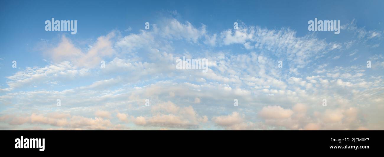 Blue sky background with tiny clouds, panorama Stock Photo - Alamy