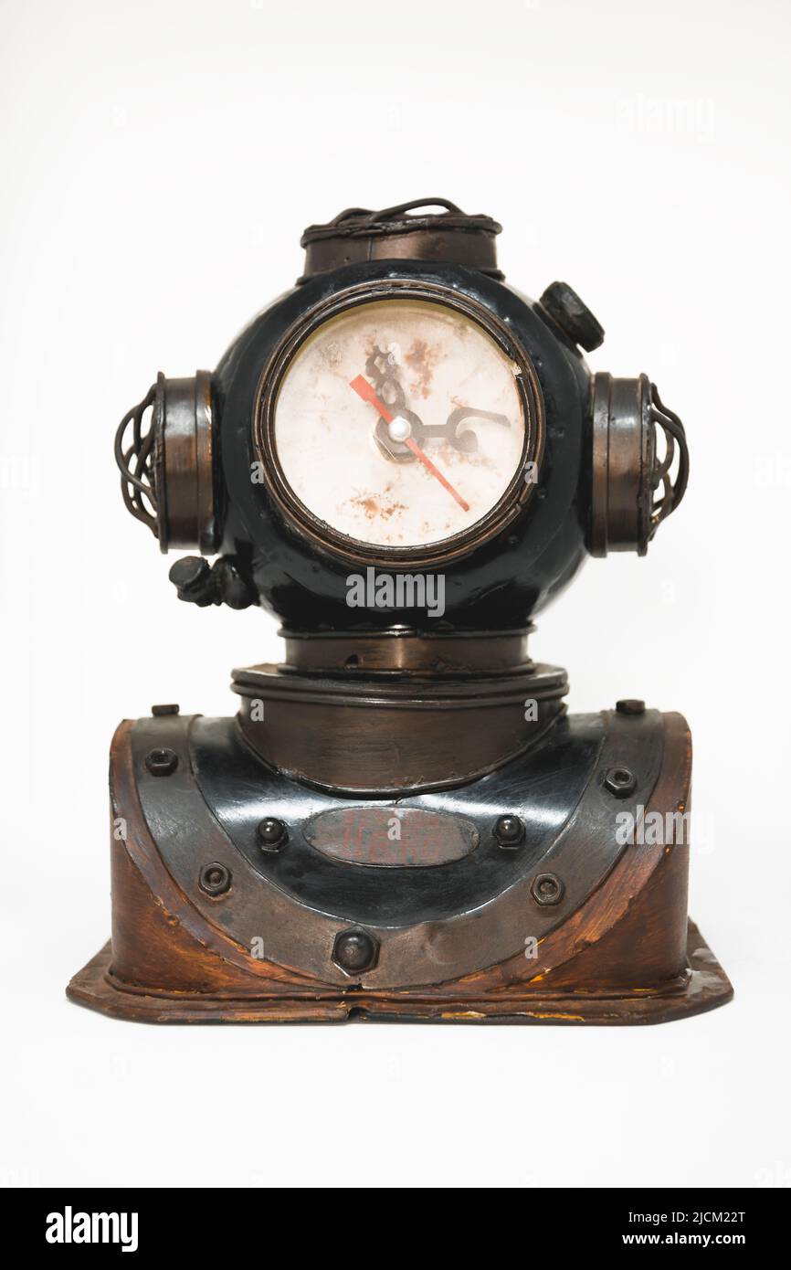 A watch in the shape of an antique diving helmet Stock Photo