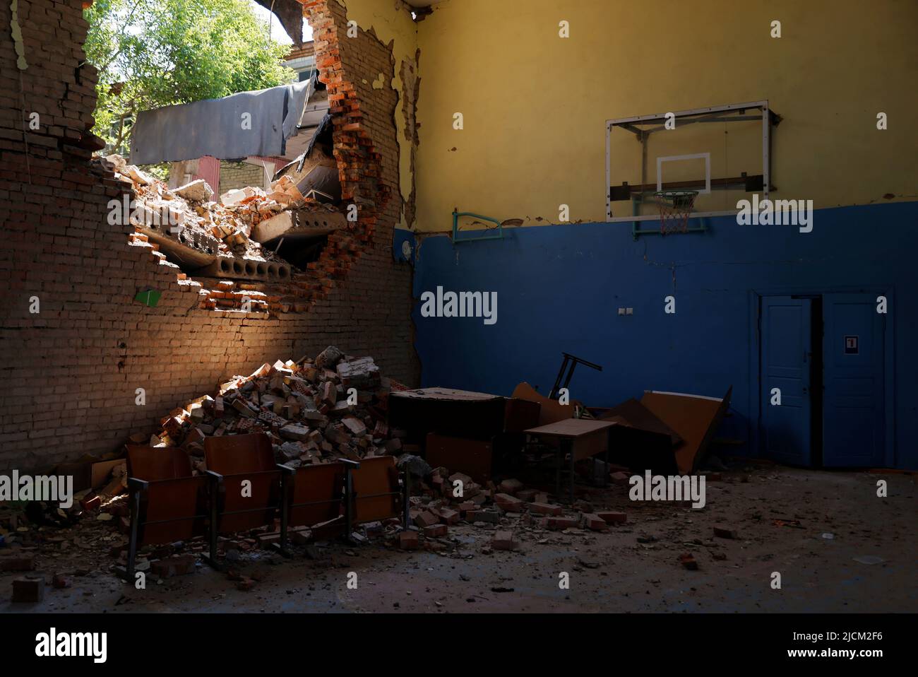 A view of the damage to a school gymnasium that was shelled, as Russia's attack on Ukraine continues, in Mykolaiv region, Ukraine June 13, 2022. Picture taken June 13, 2022.  REUTERS/Edgar Su     TPX IMAGES OF THE DAY Stock Photo