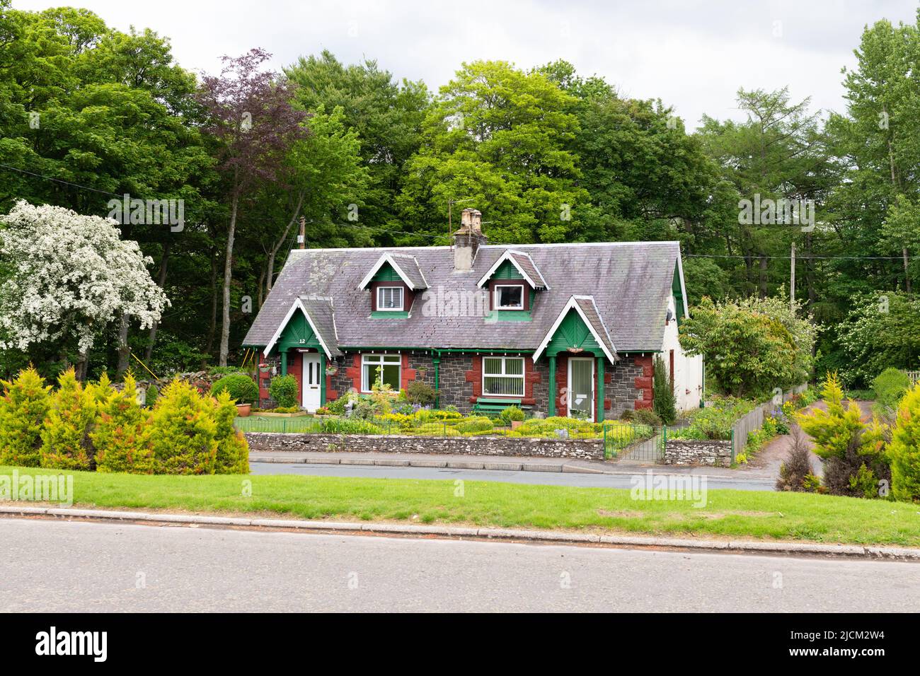 Semi-detached cottages in the village of Abington, South Lanarkshire, Scotland, UK Stock Photo