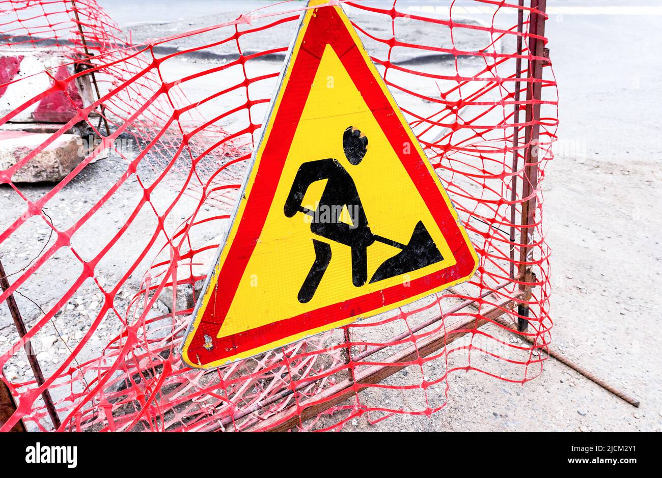 Road works sign at the city street. Under construction road Stock Photo ...