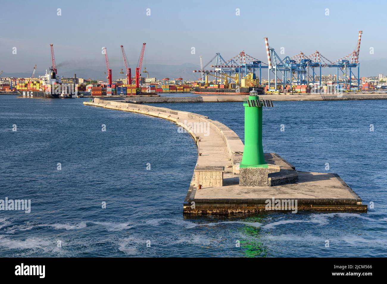 The inner break wall at the port of Naples anchors a colorful scene. Stock Photo