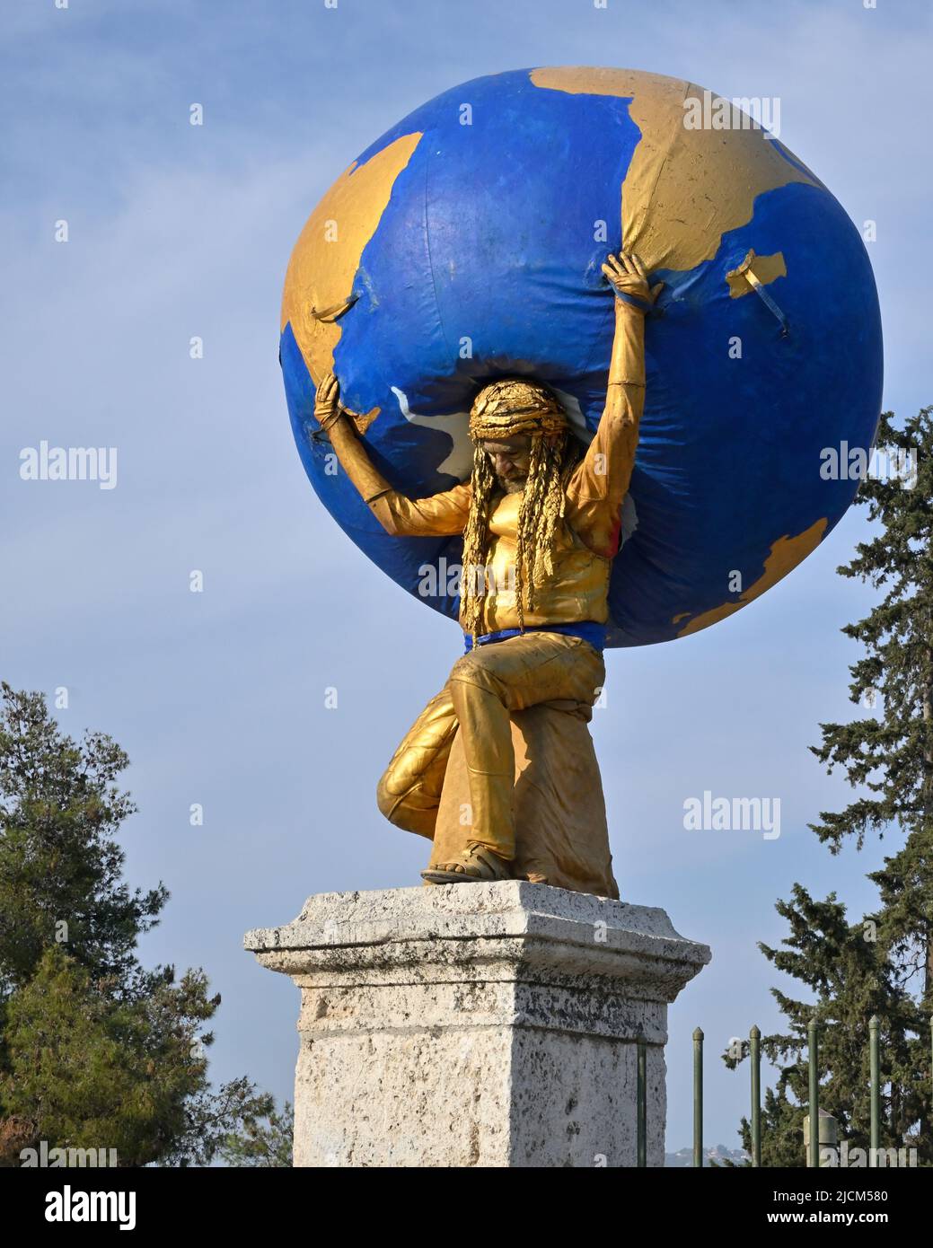 A street performer in Athens Greece doing Atlas. Stock Photo