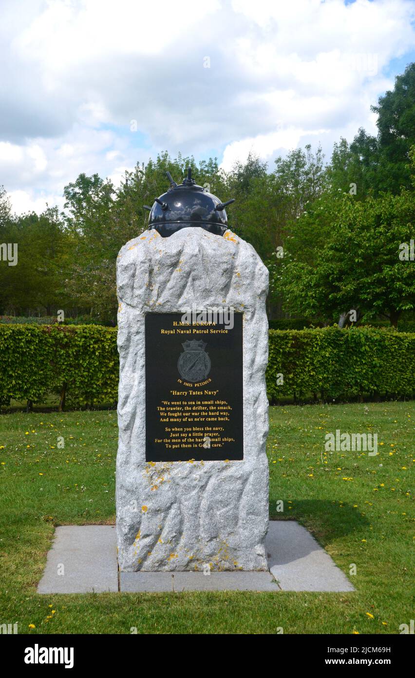 Mine on top of Stone Plinth in Honour of HMS Europa' Royal Naval Patrol Service' at the National Memorial Arboretum, Staffordshire, England, UK. Stock Photo